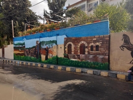 بنك الإسكان يدعم مشروع جمعية بيت التراث والفنون لرسم جداريات الفحيص الفنية